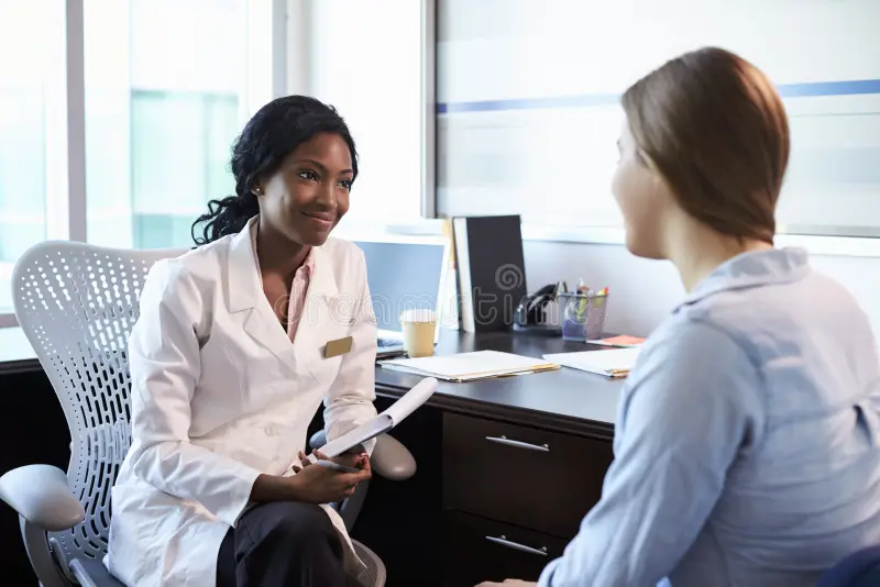Home doctor consultation female patient office 85189765